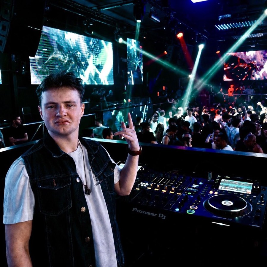 DJ Musha playing a packed club night