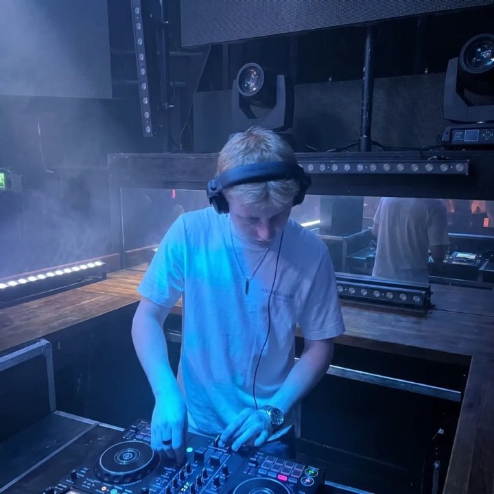 DJ Musha mixing at a club event