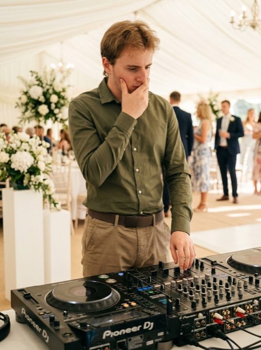 DJ Musha DJing a wedding in a marquee